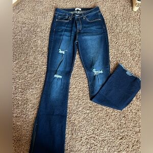YMI Bootcut Jeans with side slit. Size 11/30. Inseam 32”